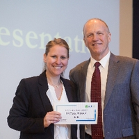 3MT First place winner Kathryn Ellens with the dean of The Graduate School